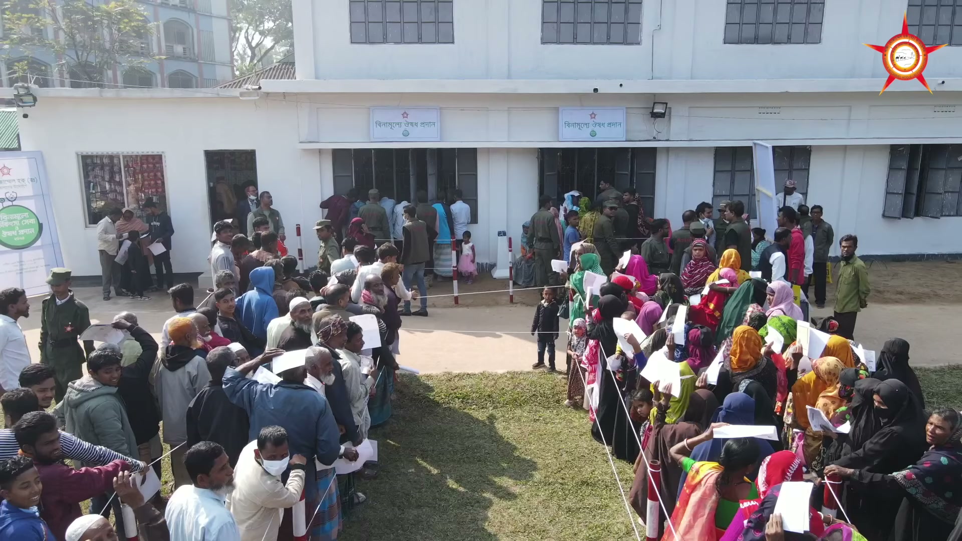 A long queue outside the camp building during the 2024 medical camp.