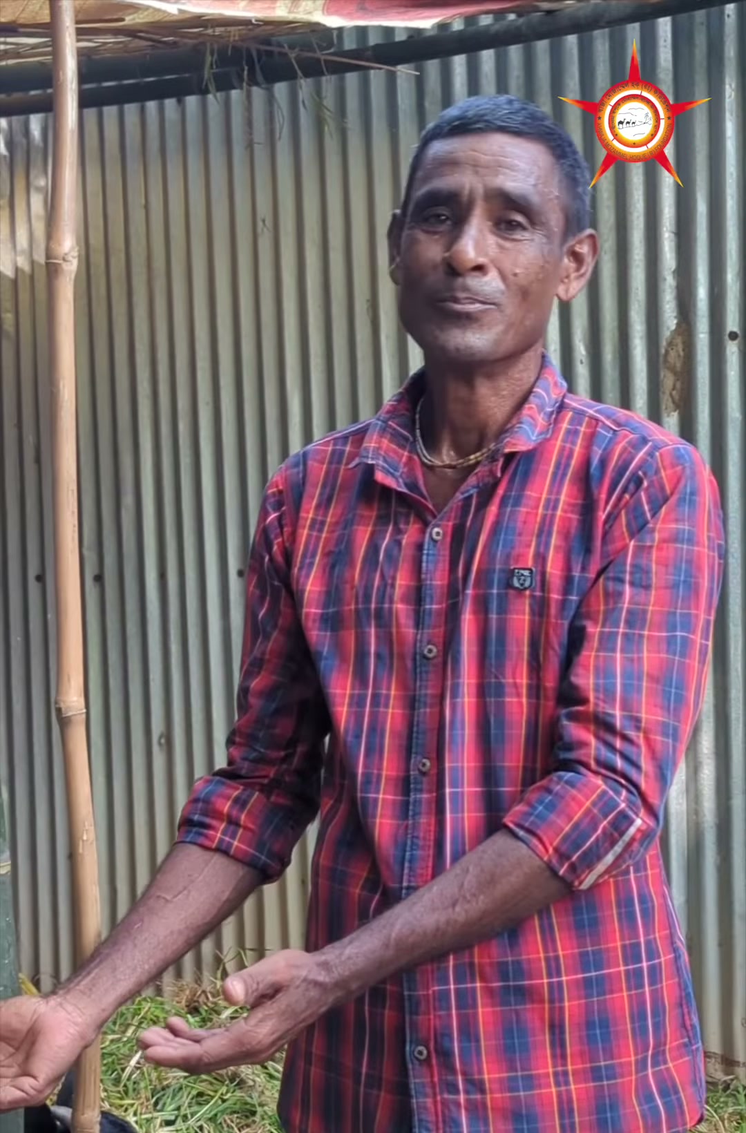 The participant introduced as Sunil Sarkar speaking to the camera near a house.