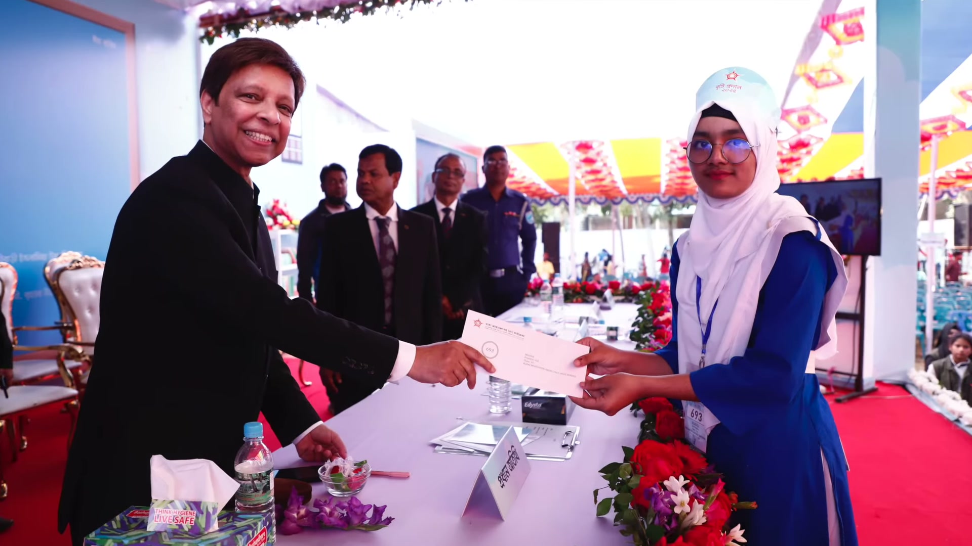 A scholarship presentation in the 2025 programme film.